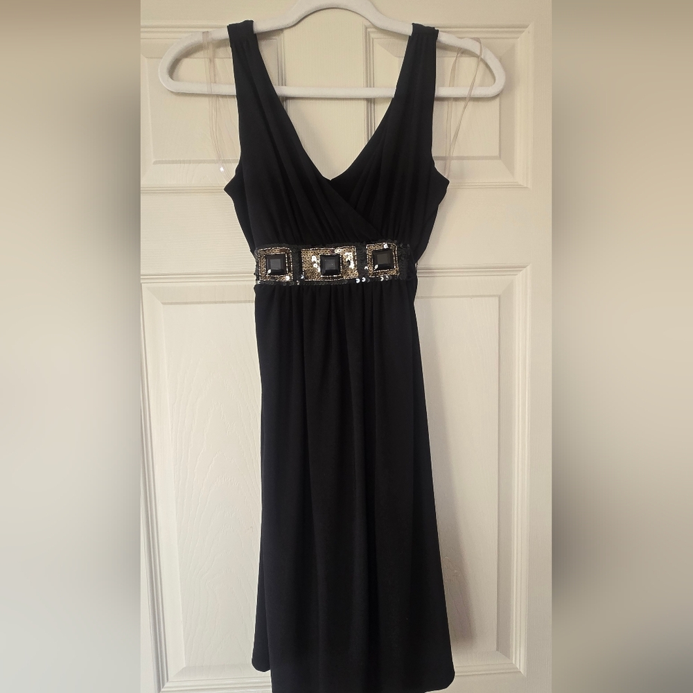Elegant Black Dress with Gold Accents